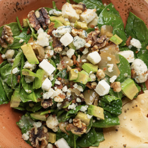 SUMMER SPINACH SALAD GF on request Baby Spinach, bacon, blue cheese, feta cheese, sauteed onions, avocado, walnuts, green apple vinaigrette